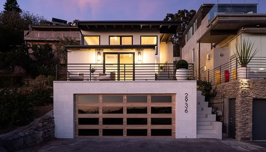 Completed exterior of 2936 Alexander Rd. at dusk