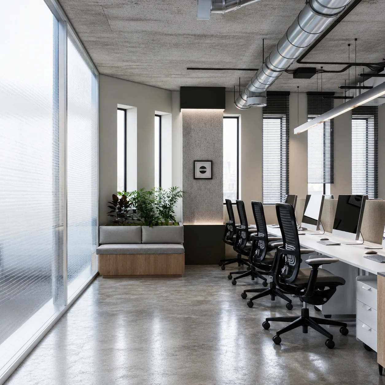 Workstations positioned beside full-height windows